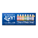 A blue package labeled Dr. Bronners JOY 7 Days of Magic Soap showcases various small bottles of Dr. Bronners soap, emphasizing eco friendly and versatile cleaning options for daily use [One Size]