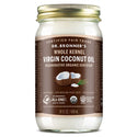 A clear glass jar of Dr. Bronners Whole Kernel Virgin Coconut Oil features a golden lid and brown label with white text. Displaying images of coconuts, it is regenerative organic certified [14 oz]