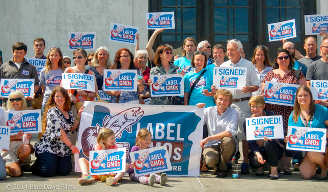 Activists holding signs.